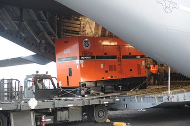 Earthquake ^ Tsunami - Pago Pago, American Samoa, October 2, 2009 -- FEMA generators are being unloaded from a C-17 military cargo plane. FEMA shipped generators from its warehouses to American Samoa to help provide electric power to critical facilities in American Samoa.