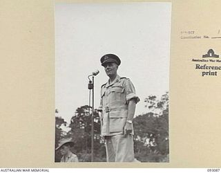 LAE AREA, NEW GUINEA, 1945-06-16. LT-GEN V.A.H. STURDEE, GOC FIRST ARMY (1), ADDRESSING THE PARADE, ATTENDED BY ALL ENGINEER COMPANIES UNDER THE COMMAND OF 11 COMMANDER, ROYAL ENGINEERS (WORKS) ..