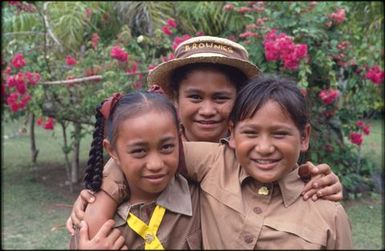 Three girls in 'Brownie' uniforms