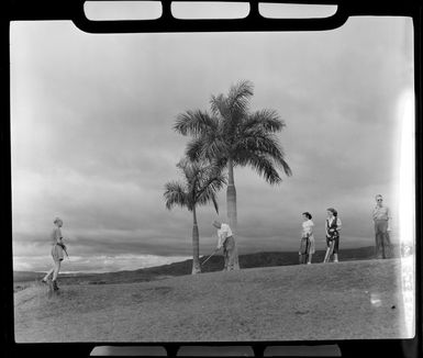 Five unidentified people playing golf, Lautoka, Fiji
