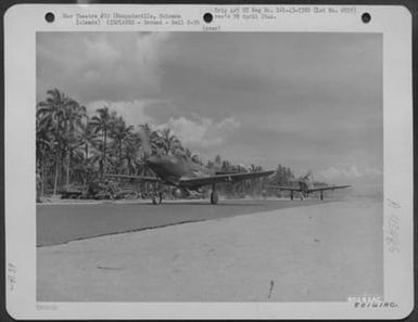 Bell P-39S Taxi Down The Strip At Cape Torokina, Bougainville, Solomon Islands Before Take-Off. 12 December 1943. (U.S. Air Force Number 80161AC)