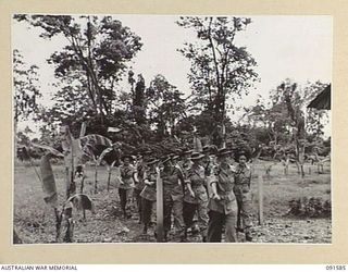 WIDE BAY, NEW BRITAIN, 1945-05-02. LAE, NEW GUINEA, 1945-05-09. AUSTRALIAN WOMEN'S ARMY SERVICE AT HEADQUARTERS FIRST ARMY MARCH PAST THE GARRISON CHAPEL TO ATTEND THE ROMAN CATHOLIC THANKSGIVING ..