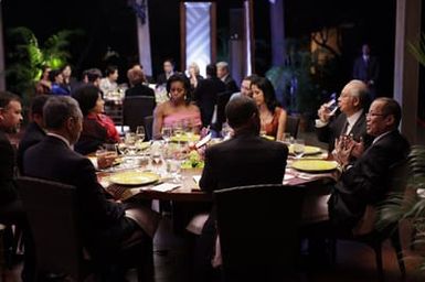 Barack Obama and Michelle Obama attend the Leaders Dinner at the APEC summit in Honolulu, Hawaii, November 12, 2011