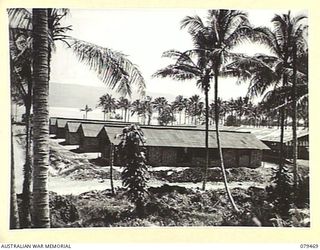 PALMALMAL PLANTATION, NEW BRITAIN. 1945-03-09. STOREHOUSES OF THE 31ST STORES DEPOT COMPANY, SITUATED IN A CLEARED AREA OF THE PLANTATION