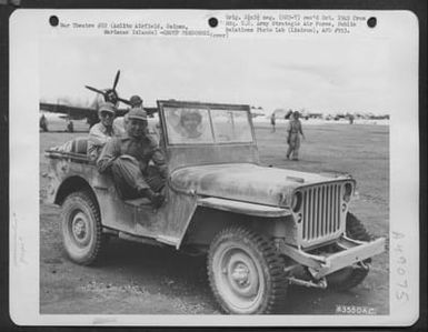 Shortly After Their Arrival, Major General Willis H. Hale And Vice Admiral John H. Hoover Are Driven Around Aslito Airfield, Saipan, Marianas Islands. 28 June 1944. [Hale Is In Front Passenger Seat] (U.S. Air Force Number 63550AC)