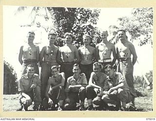 NAGADA, MADANG AREA, NEW GUINEA. 1944-08-02. PERSONNEL OF THE 2ND SUPPLY DEPOT PLATOON. IDENTIFIED PERSONNEL ARE:- QX60513 PRIVATE A.C. HUGGINS (1); VX106588 PRIVATE A.E. CROUCH (2); VX89046 ..