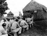 Outdoor military church service for Company K. 164th Infantry on Fiji