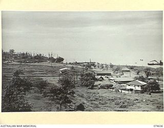 LAE. NEW GUINEA. 1944-07. ONE OF A NUMBER OF PHOTOGRAPHS TAKEN TO GIVE A 120 PANORAMIC VIEW OF THE TOWN OF LAE. TO JOIN TO PHOTOGRAPHS NO. 74635, 74637, 74638, 74639 AND 74640
