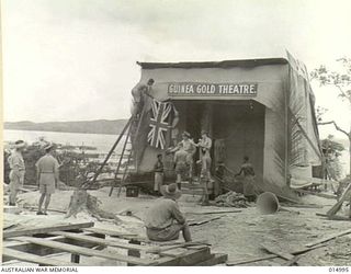 1943-06-11. NEW GUINEA. THE FINISHING TOUCHES BEING MADE TO THE STAGE ERECTED FOR MELODY PARADE TALENT QUEST, BEING CONDUCTED BY THE NEW GUINEA ARMY PAPER "GUINEA GOLD". ON THE NIGHT OF THE FIRST ..