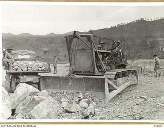 PORT MORESBY, NEW GUINEA. 1943-06-26. NINE MILE QUARRY WAS WORKED BY NATIVE LABOUR UNTIL 1942-02, WHEN IT WAS TAKEN OVER BY THE MILITARY FORCES. IT WAS THEN WORKED FOR PERIODS OF ABOUT SIX MONTHS ..
