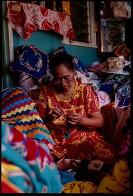 Woman sewing tivaevae, Rarotonga, Cook Islands