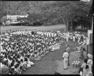 Governor General, Lord Freyberg, speaking to school children in Rarotonga, Cook Islands - Photograph taken by E P Christensen