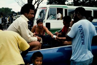 Papua New Guinea: Bus depot, people eating beetle nuts