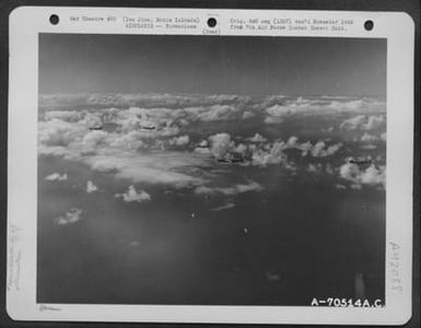 Consolidated B-24 "Liberators" Roar Over A Wide Expanse Of Water As They Head Toward Iwo Jima, Bonin Islands, For Another Strike On Jap Installations On The Tiny Island, Halfway Between Saipan And The Japanese Homeland. 21 October 1944. (U.S. Air Force Number A70514AC)