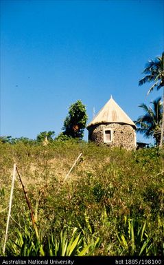 New Caledonia - small stone hut on hillside