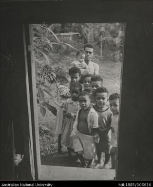 Man with group of children