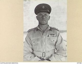 LAE, NEW GUINEA. 1945-10-04. BRIGADIER G.B.G. MAITLAND, DIRECTOR OF MEDICAL SERVICES HEADQUARTERS FIRST ARMY