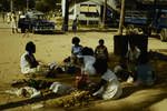 Clan group selling betel nut at native market,Port Moresby