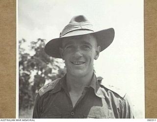 LALOKI RIVER, NEW GUINEA. 1943-11-09. NX1977 LIEUTENANT B. WARING, SIGNAL OFFICER OF THE 25TH AUSTRALIAN INFANTRY BATTALION