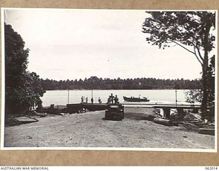 DREGER HARBOUR, NEW GUINEA. 1943-12-05. DOCK BUILT BY TROOPS OF THE 870TH UNITED STATES AVIATION ENGINEER BATTALION