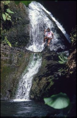 Woman in waterfall, Rarotonga