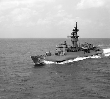 A port bow view of the frigate USS COOK (FF-1083) underway en route to Hawaii