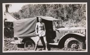 [Henry J. Cates, Jr., Standing with Truck]