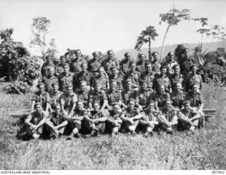 Torokina, Bougainville. 1945-10-12. Group portrait of the members of C Troop, 5th Battery, 2nd Field Regiment. Left to right, back row: VX87801 Bombardier (Bdr) A. J. Noisette of Clifton Hill, Vic; ..