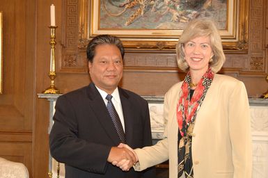 Marshall Islands President Kessai Note, left, visiting Department of Interior headquarters for meeting with Secretary Gale Norton