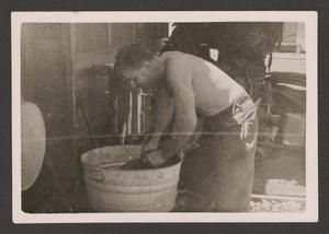 [Elmer Johnston with Basin]