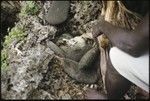 Man on top of skull shrine