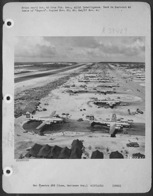 Squatting In Their Dispersal Area At North Field, Guam, (Marianas Group) Are Planes Of The 29Th Bomb Group, 314Th Wing. This View, Looking East, Shows Part Of The Southwestern Area Of North Field. The 19Th B.G.'S B-29'S Are Located In The Background. (U.S. Air Force Number 59022AC)