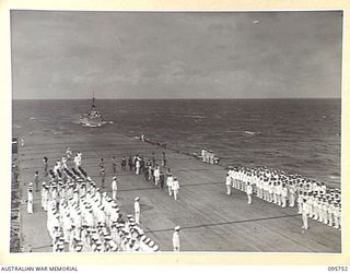 AT SEA OFF RABAUL, NEW BRITAIN. 1945-09-06. GENERAL H. IMAMURA, COMMANDER EIGHTH AREA ARMY, AND JAPANESE SURRENDER PARTY, WALKING TOWARDS LIEUTENANT GENERAL V.A.H. STURDEE, GENERAL OFFICER ..