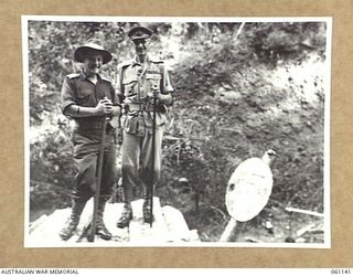 FARIA VALLEY, NEW GUINEA. 1943-11-14. MAJOR GENERAL J. S. LETHBRIDGE CBE MC LEADER OF THE BRITISH MILITARY MISSION TO AUSTRALIA (LEFT) AND VX9 MAJOR GENERAL G. A. VASEY CB CBE DSO (RIGHT)