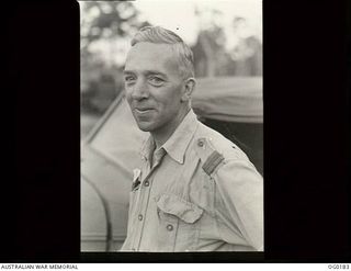 VIVIGANI, GOODENOUGH ISLAND, PAPUA NEW GUINEA. 1943-09-26. INFORMAL PORTRAIT OF PILOT OFFICER ARTHUR GREEN OF LOCKLEY, SA, A MEMBER OF NO. 7 MOBILE WORKS SQUADRON RAAF