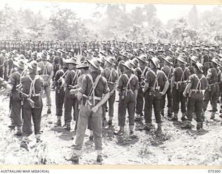 MADANG, NEW GUINEA. 1944-08-15. VX27 MAJOR GENERAL A.H. RAMSAY, CBE, DSO, ED, GENERAL OFFICER COMMANDING 5TH DIVISION, ADDRESSING A PARADE OF MEMBERS OF THE 22ND BATTALION PRIOR TO THE UNIT ..