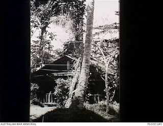 Lesson Point, Rabaul, New Britain, 1945-10. A house that served as the wardroom for a unit of the Air Arm of the Imperial Japanese Navy based at Rapopo Airfield. Electric power lines are connected ..