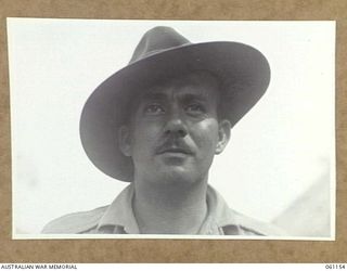 PORT MORESBY, NEW GUINEA. 1943-12-03. NX9706 WARRANT OFFICER CLASS 1 C. T. HALMARICK, MILITARY HISTORY SECTION, ATTACHED TO HEADQUARTERS, NEW GUINEA FORCE