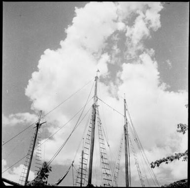 Three masts of a ship against the sky, New Guinea, ca. 1936 / Sarah Chinnery