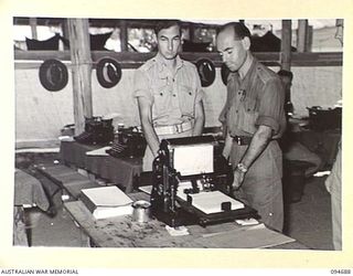 YALU, NEW GUINEA. 1945-08-03. STUDENTS OPERATING A ROTARY DUPLICATOR DURING THE CLERICAL COURSE NO. 4 CONDUCTED AT THE NEW GUINEA TRAINING SCHOOL