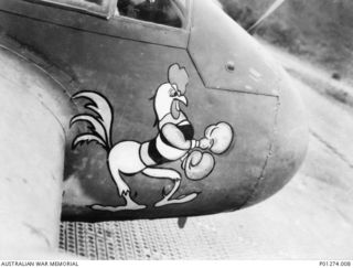 The nose art showing a boxing rooster on a Beaufighter aircraft (A19-74) of 30 Squadron, RAAF. This aircraft later crashed into the sea off Goodenough Island on 11 August 1943 killing both crew ..