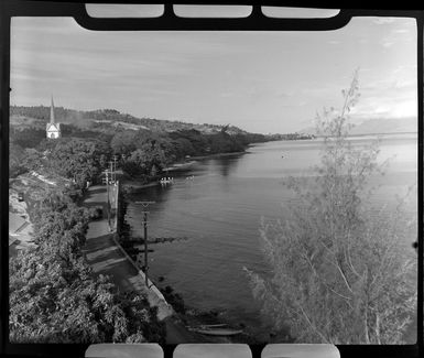 View from Grand Hotel, Tahiti, shows church steeple, road and lagoon