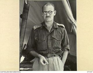 FINSCHHAFENAREA, NEW GUINEA, 1944-03-21. VX16046 LIEUTENANT A.G. CUFF, MBE, AN OFFICER ON STAFF DUTIES, HEADQUARTERS, 2ND AUSTRALIAN CORPS