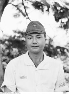 RABAUL, NEW BRITAIN. 1945-10-18. MR HATTORI, JAPANESE INTERPRETER FROM GENERAL IMAMURA'S STAFF, AT HEADQUARTERS 11 DIVISION