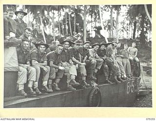 KEIP, NEW BRITAIN. 1945-02-17. TROOPS OF THE 14/32ND INFANTRY BATTALION CROWD AN LCM (LANDING CRAFT MECHANISED) FOR TRANSPORT TO KAMANDRAN