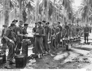 SIAR, NEW GUINEA. 1944-06-20. TROOPS OF HEADQUARTERS, 58/59TH INFANTRY BATTALION LINE UP FOR THEIR LUNCH AT THE UNIT MESS. IDENTIFIED PERSONNEL ARE:- V45072 PRIVATE C. WOLHAGEN (1); VX102647 ..