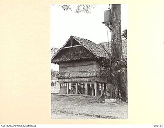 LAE, NEW GUINEA. 1945-04-08. THE SIDE VIEW OF THE COMMANDER-IN-CHIEF'S HUT, HEADQUARTERS FIRST ARMY