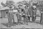 Pig festival, pig sacrifice, Kompiai: decorated men with drums, prepared to dance