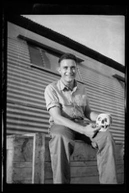 [Elmer A. Ball with human skull]