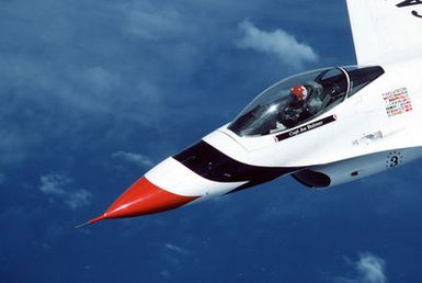 Captain (CPT) Joe Bulmer, a member of the US Air Force Thunderbirds flight demonstration team, pilots his F-16 Fighting Falcon aircraft during a performance on their 1987 Pacific tour which encompasses nine countries and Guam